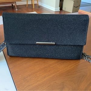 La Regale black glitter clutch